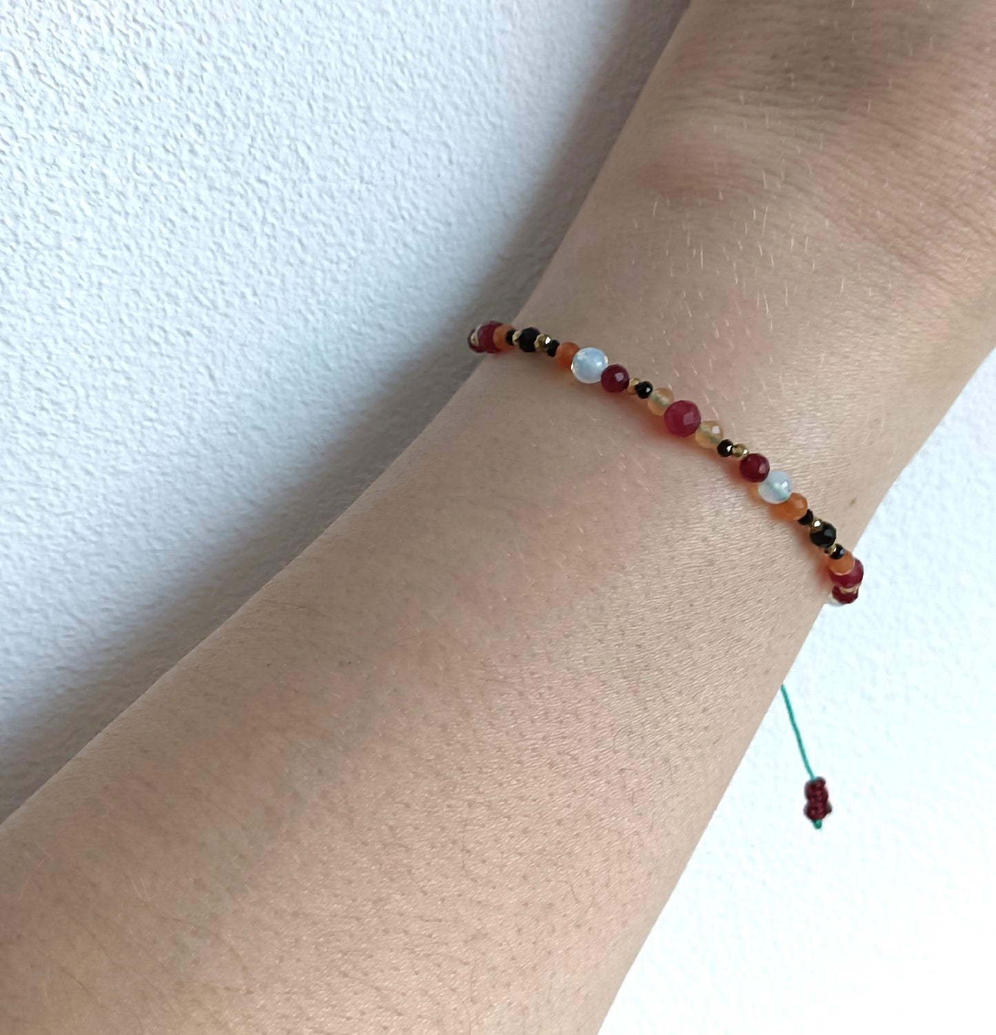 Bracelet made of natural stones. Aries zodiac sing.