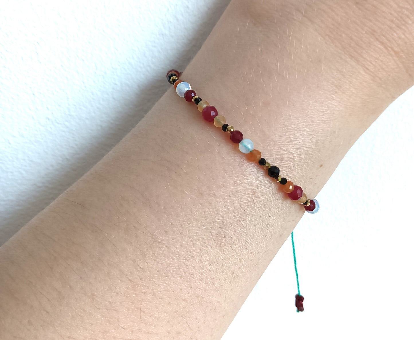 Bracelet made of natural stones. Aries zodiac sing.