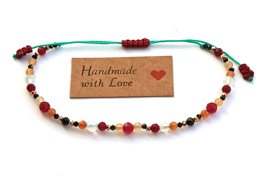 Bracelet made of natural stones. Aries zodiac sing.